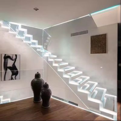 Escadaria flutuante de luz LED sólida personalizada com viga de aço oculta e barranco de vidro