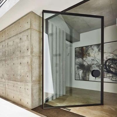 Porta de entrada de alumínio de liga de pivô personalizada Porta giratória de vidro pesada